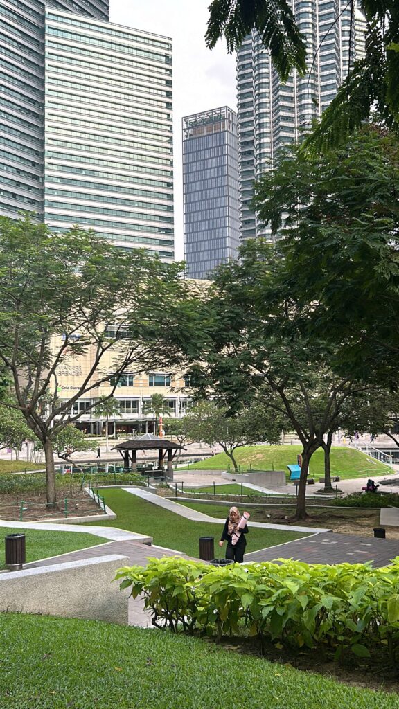 Greenery and trees and picnic gazebos at the KLCC park